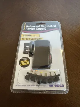 Arista 025284940088 Universal Regulated Power Supply. 2500 Ma 3-7 Volts. Use Worldwide. New. Sealed