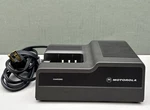 Motorola Ntn 4635A Battery Charger 117V 60HZ 30MA, Out 22VDC 120MA. Fixed Price $19.99.