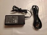 Netgear 332-10318-01 AD8180LF Power Supply 12V 5.0A Works For Led Strip Light. Fixed Price $14.00.